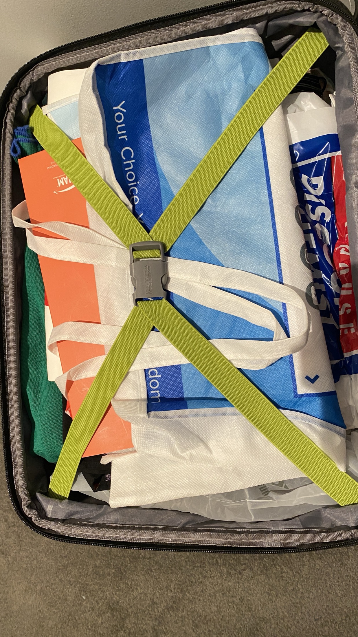 Open suitcase with packed contents
