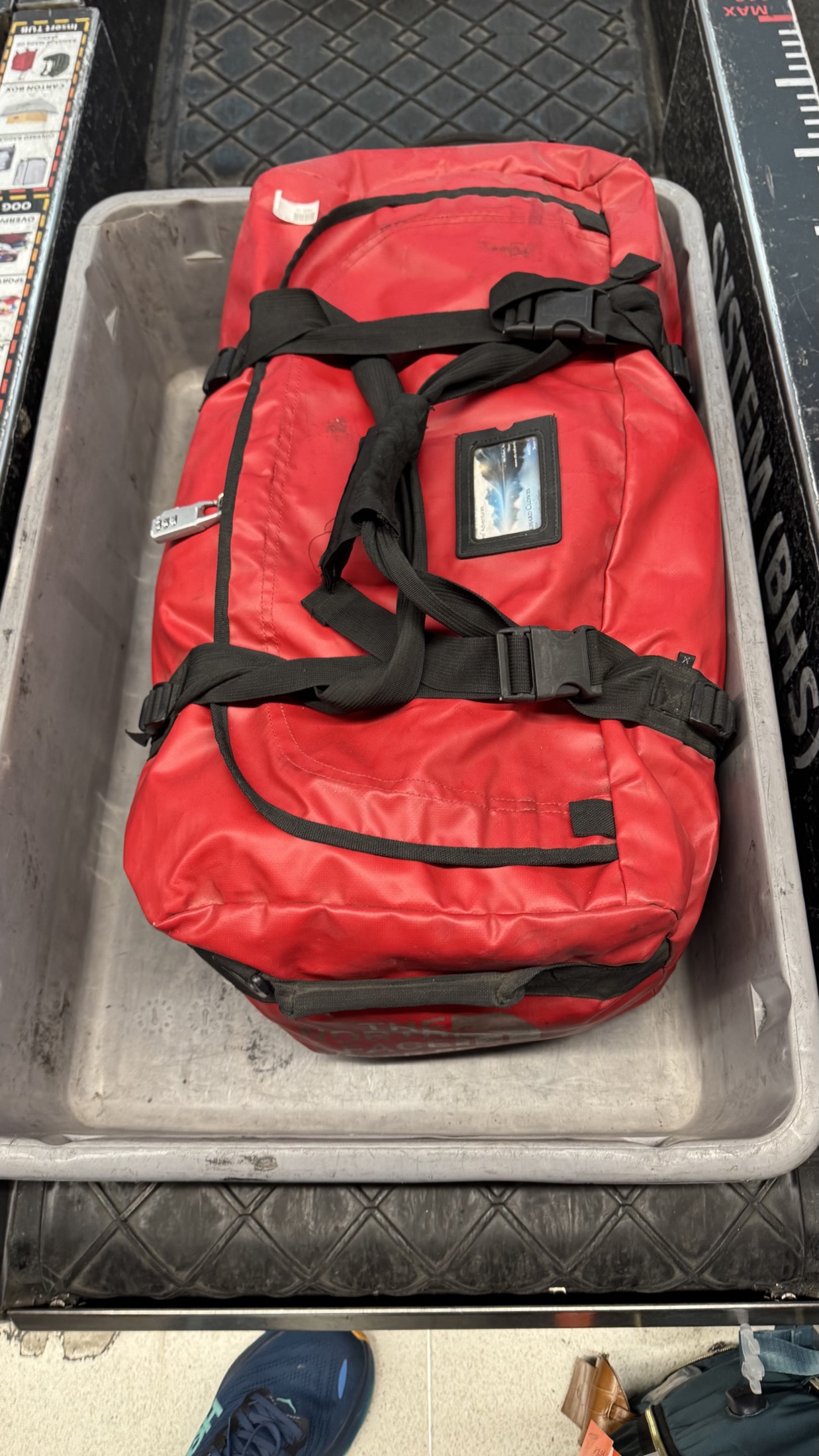Soft duffel bag on baggage belt